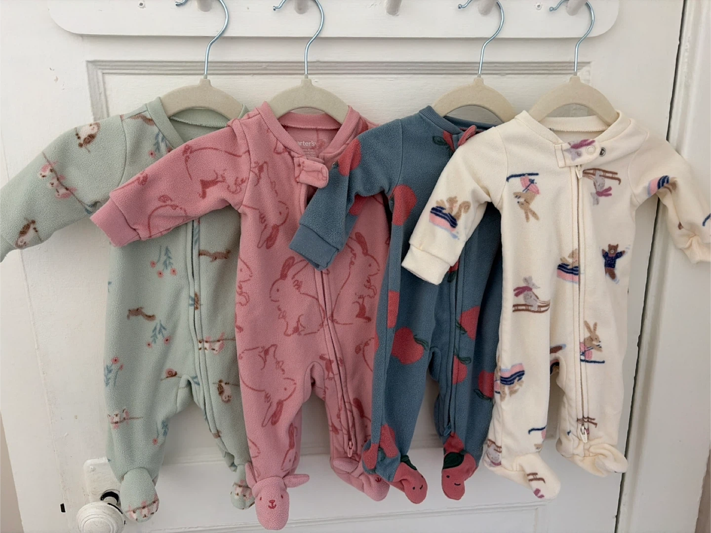 Newborn Fleece Footed Sleepers - Set of 4