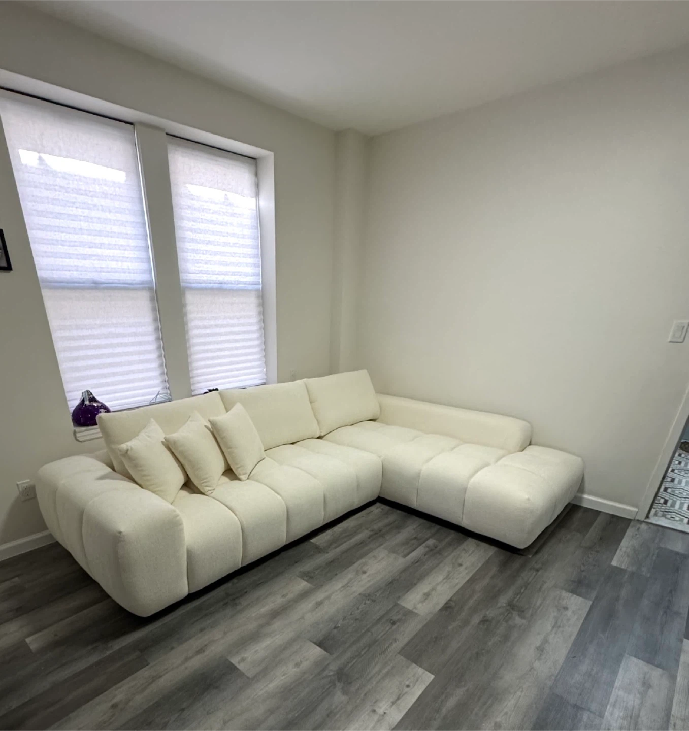 White Sectional Sofa with Pillows