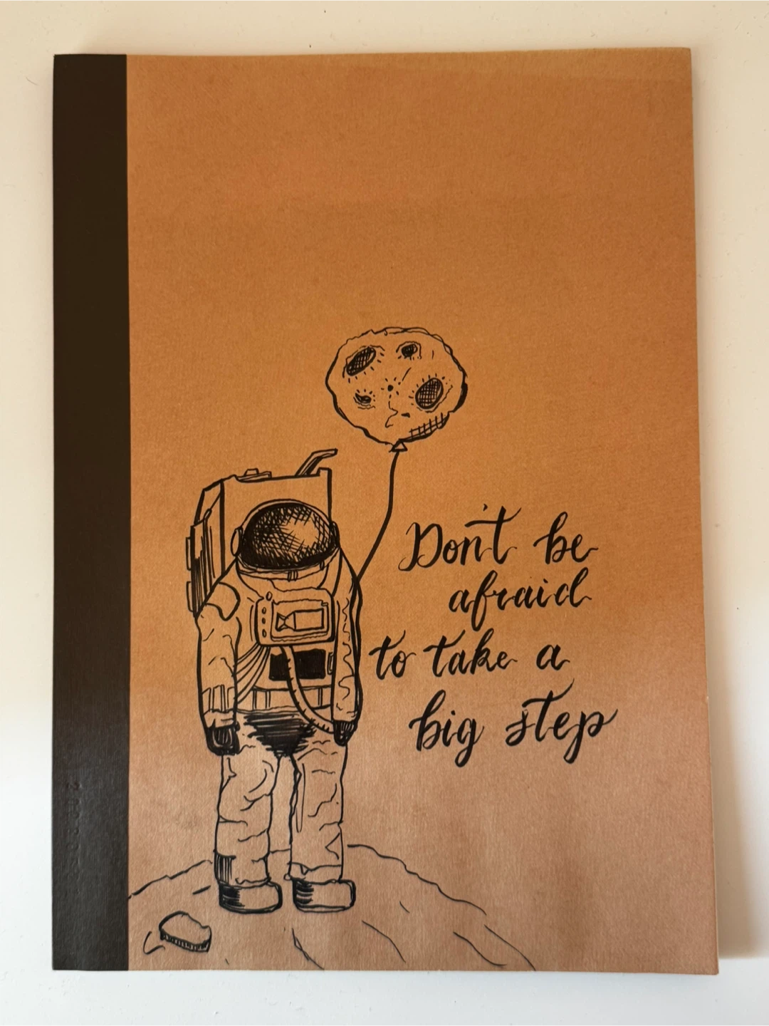 A hand-drawn notebook