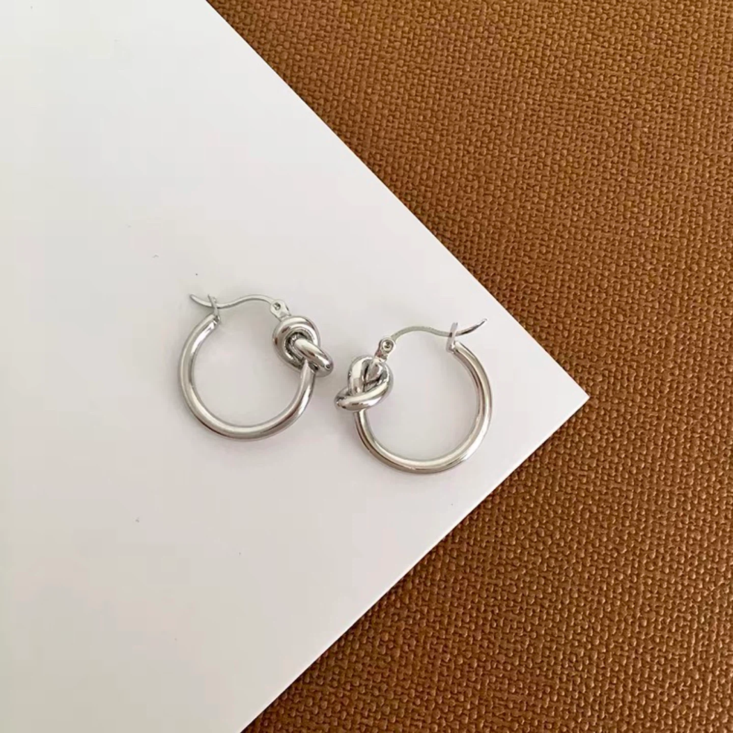 Silver knot hoop earrings