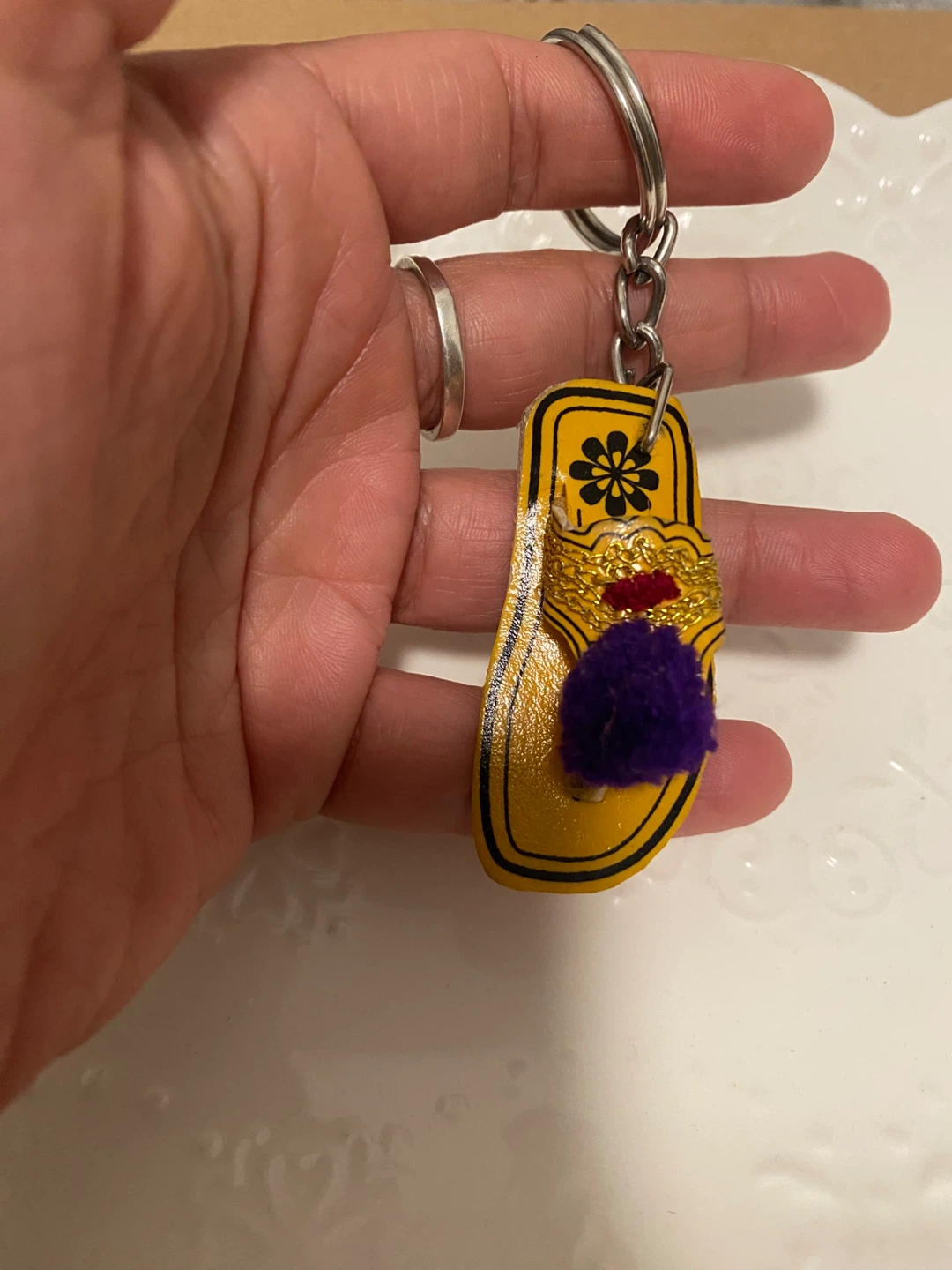 New ( unused) Ethnic Flip Flop Keychain with pom-pom