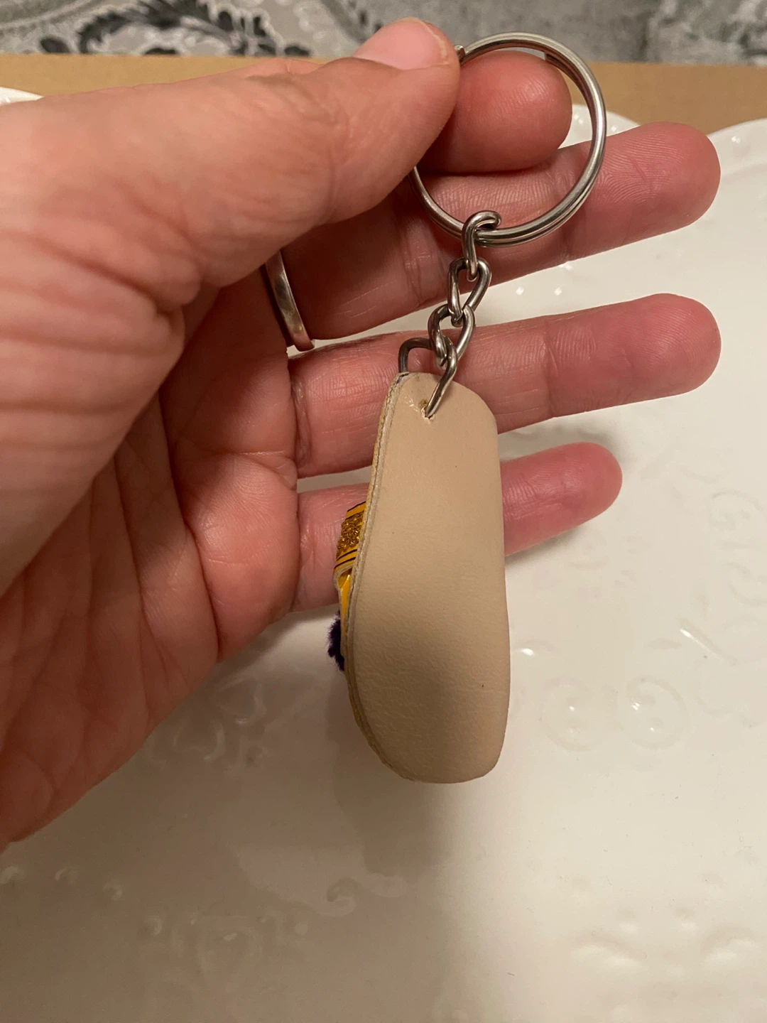New ( unused) Ethnic Flip Flop Keychain with pom-pom - photo 3