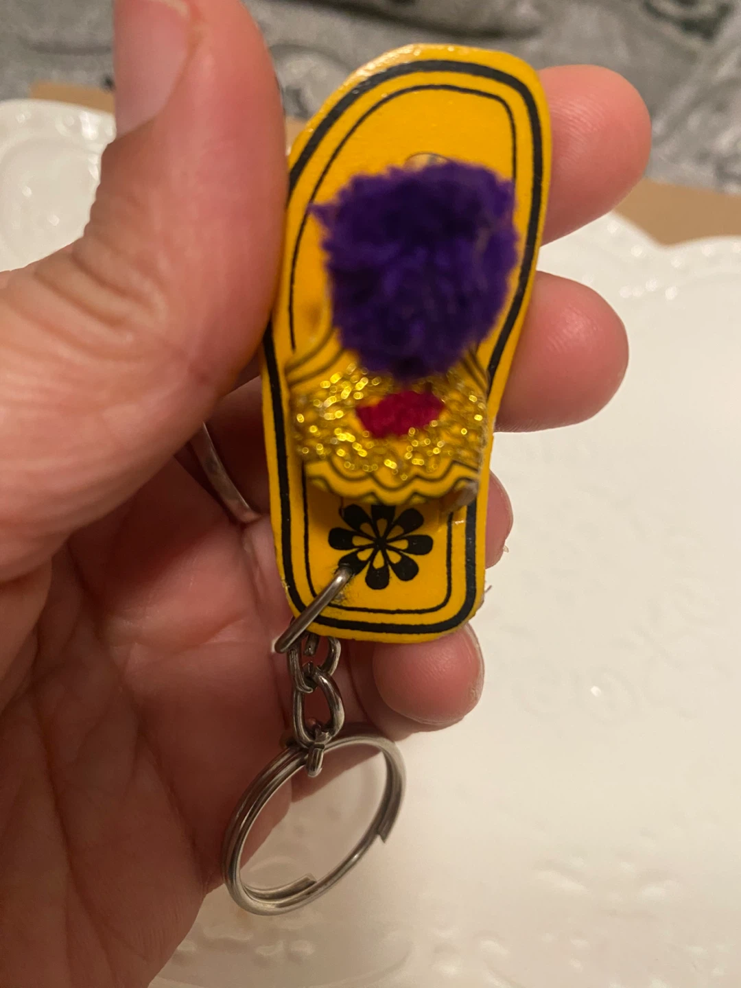 New ( unused) Ethnic Flip Flop Keychain with pom-pom - photo 2