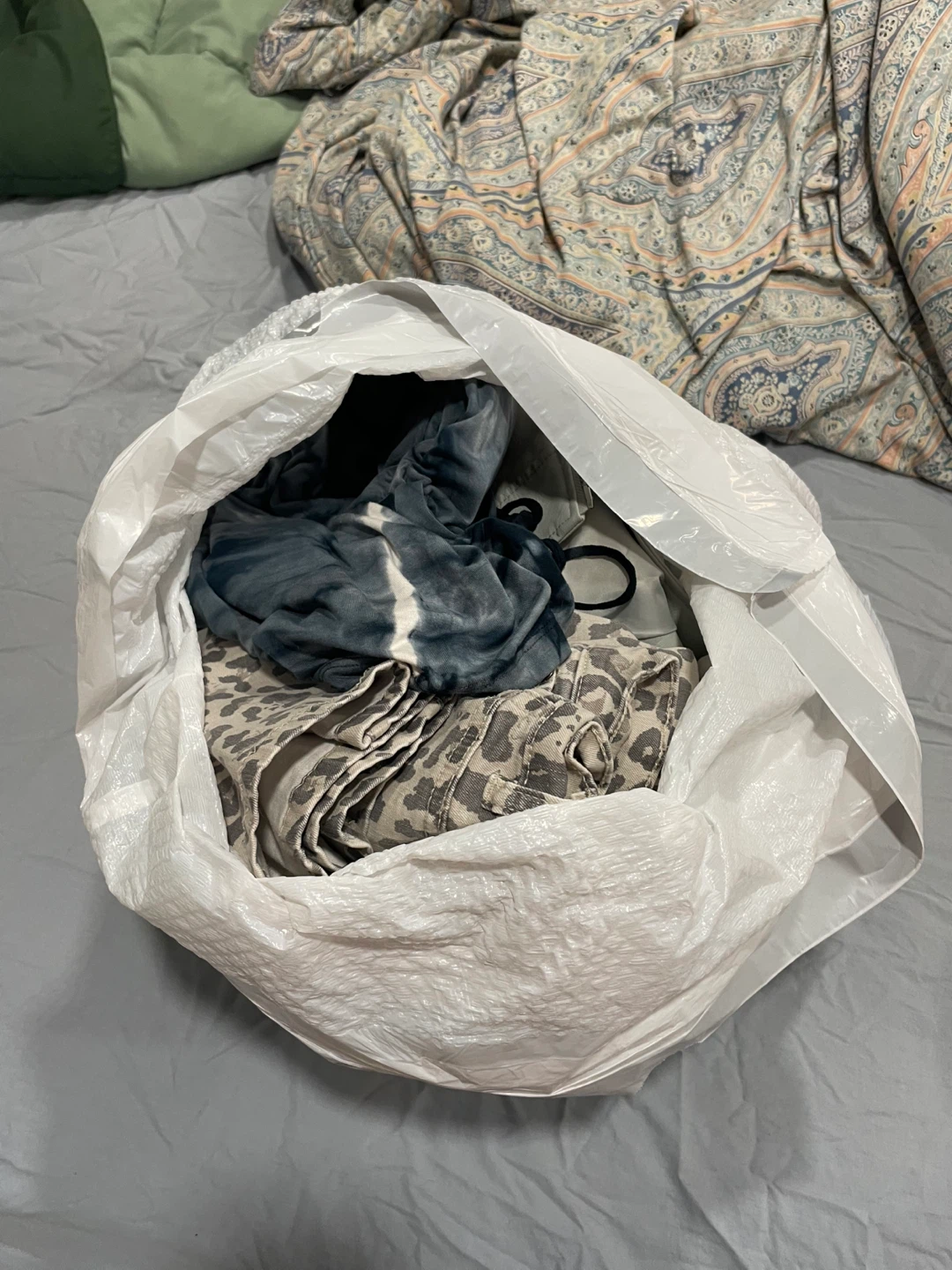 Bag of assorted clothing items