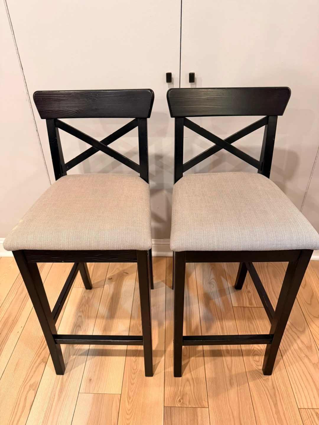 Set of 2 Black Counter Height Stools with Beige Fabric Seats