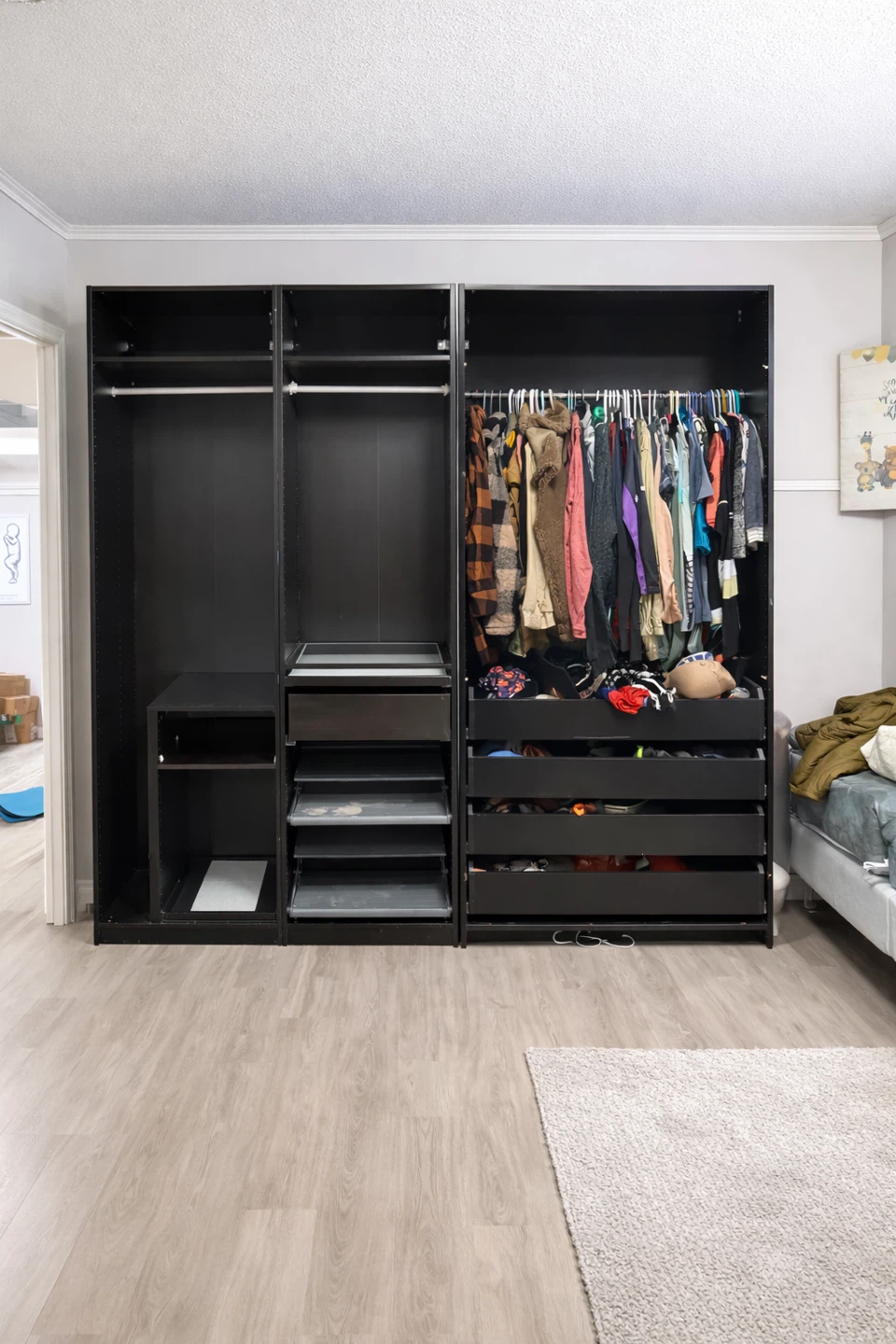 Black Wardrobe System with Hanging Rods and Drawers