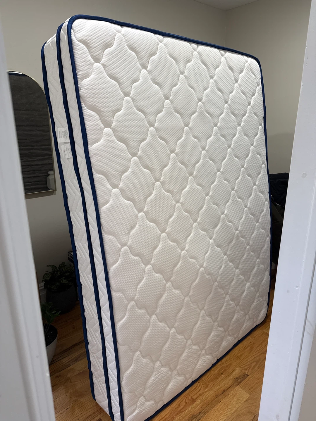 White Mattress with Blue Trim