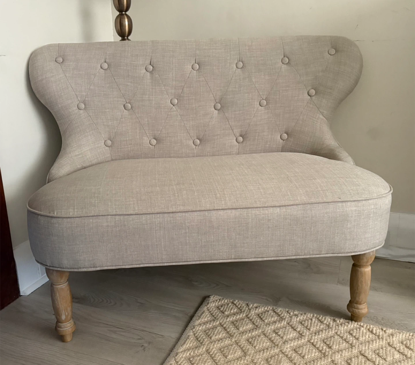 Upholstered Loveseat with Tufted Back and Nailhead Trim