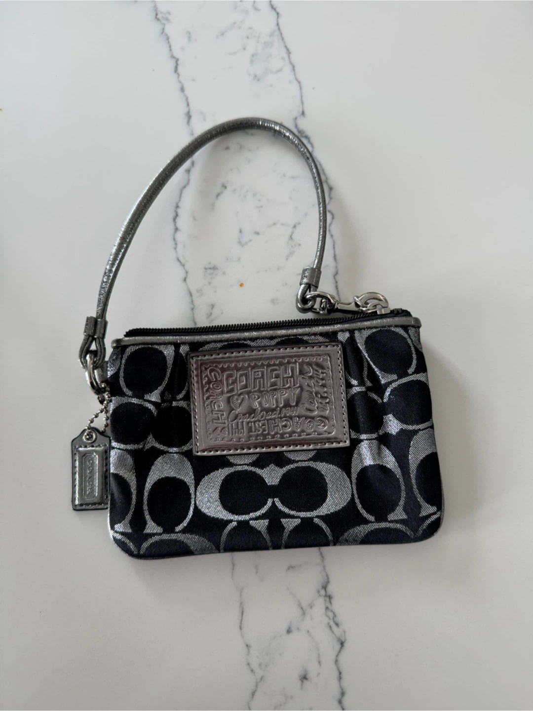 Coach Wristlet Black Silver Signature Pattern