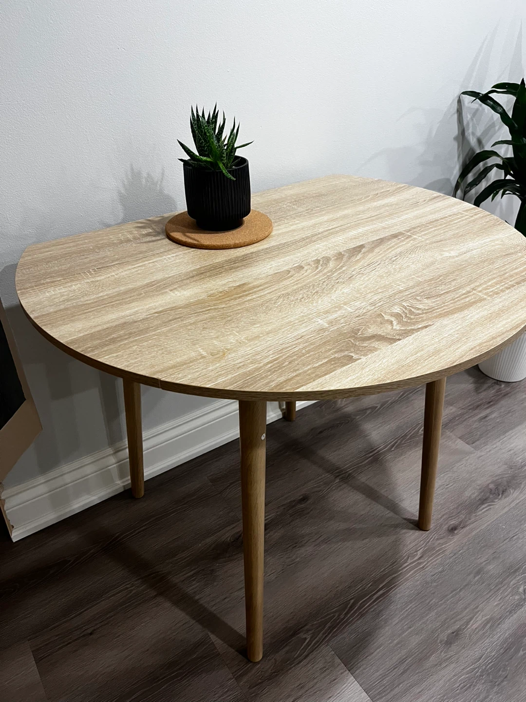 Brand New Round dining table with 2 folding leaves (never used)