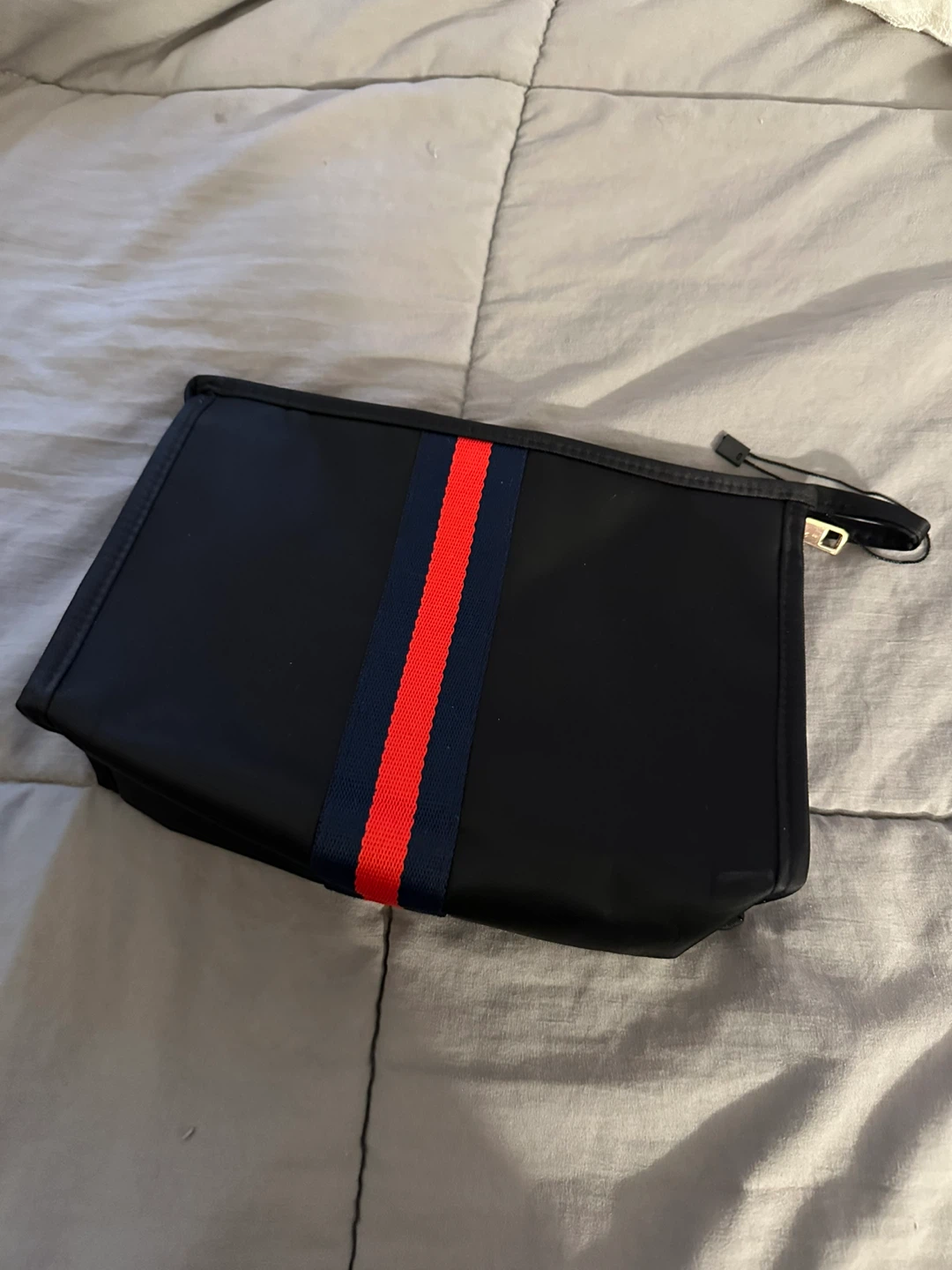 Black Cosmetic Bag with Red and Blue Stripe