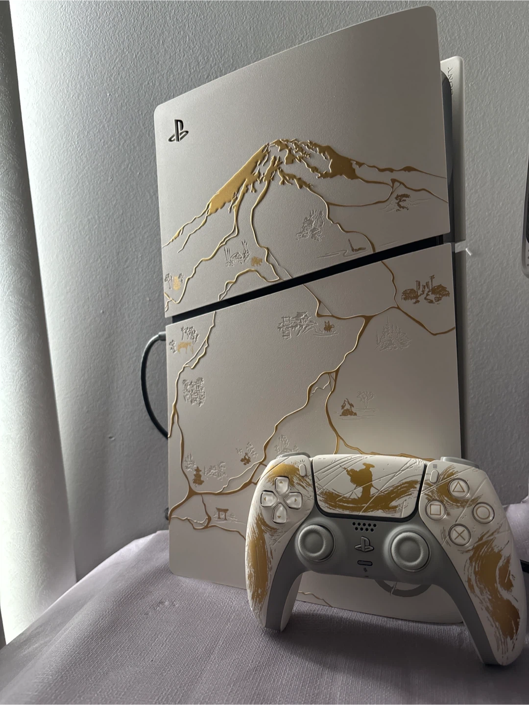 PlayStation 5 Console and Controller - Ghost of Yotei Gold LE