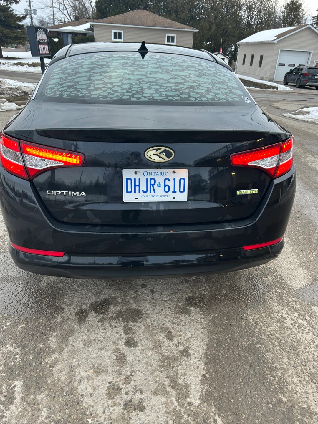 Black Kia Optima Hybrid. 2013. 279,000 kl