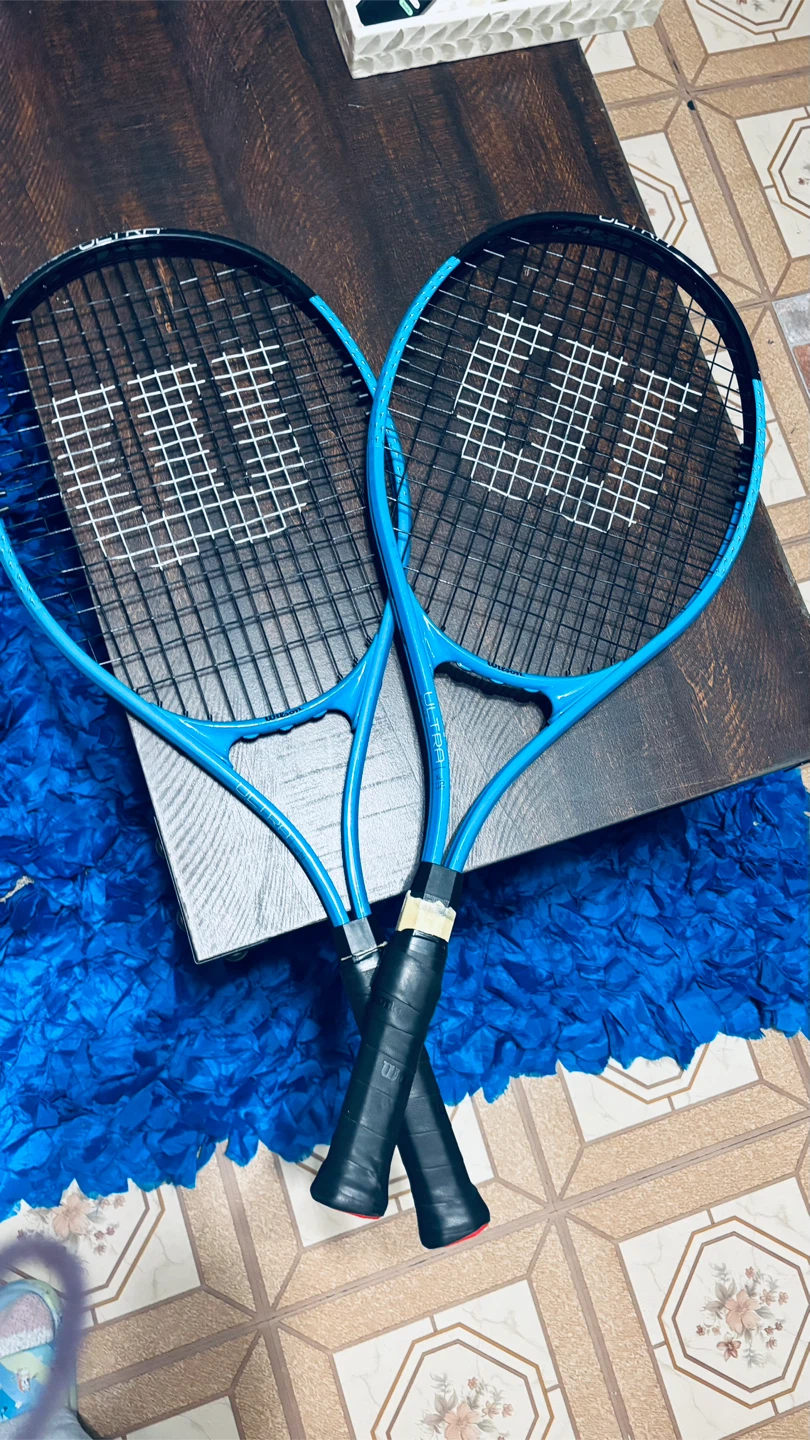 Wilson Titanium Tennis Racquets with Balls