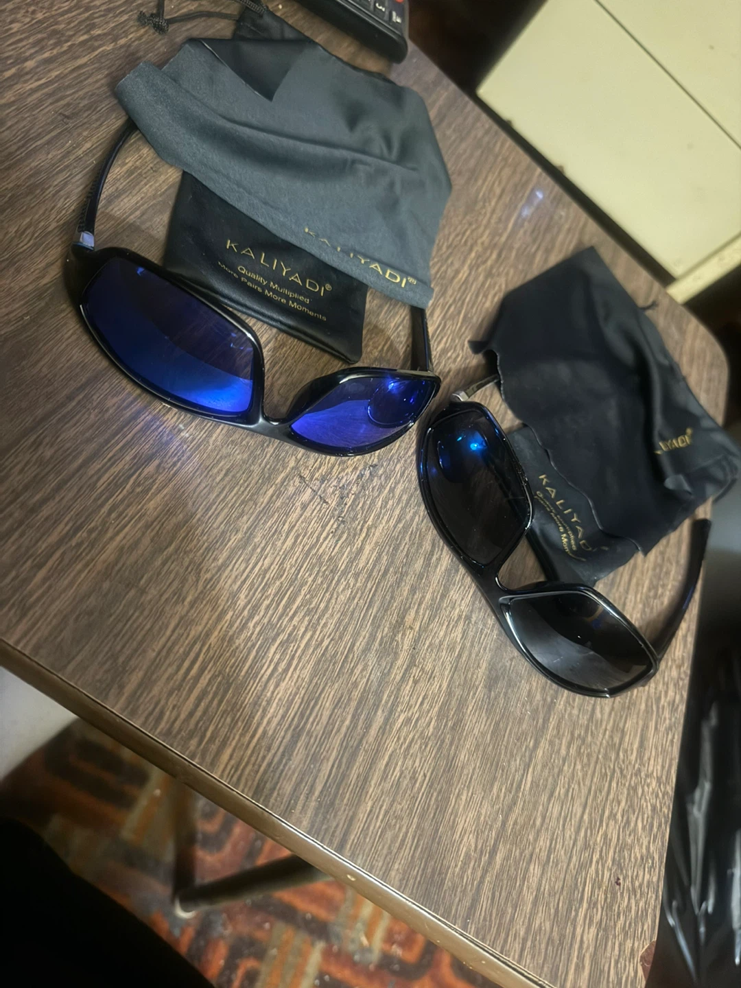 A pair of black, a pair of blue polarized sunglasses! - photo 4