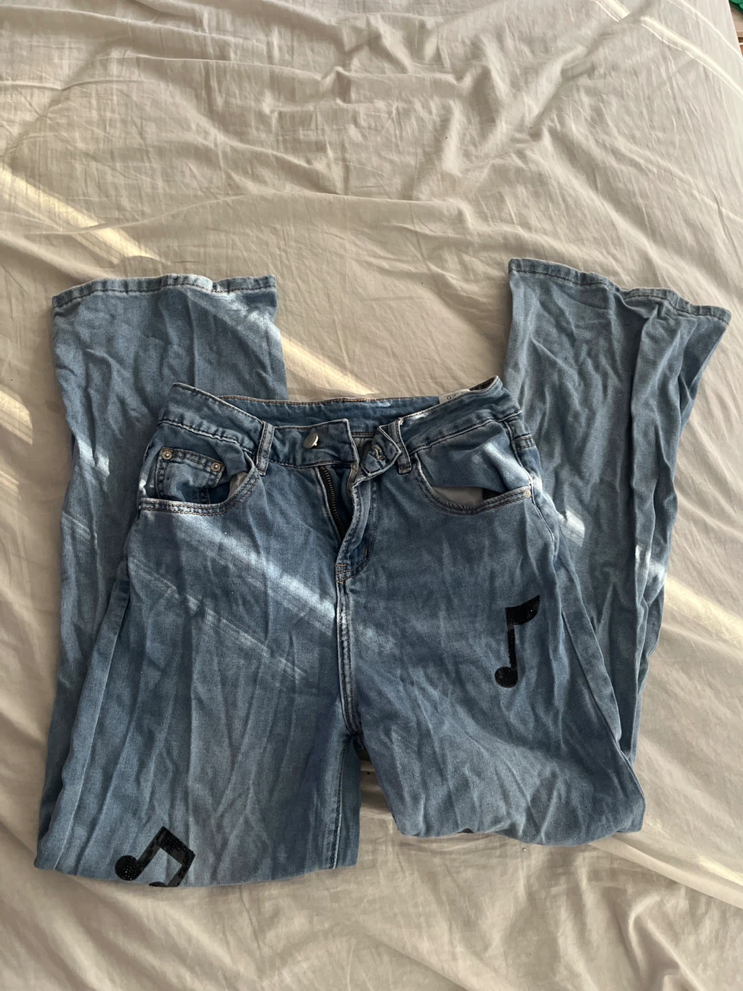Light Wash Denim Jeans with Musical Notes