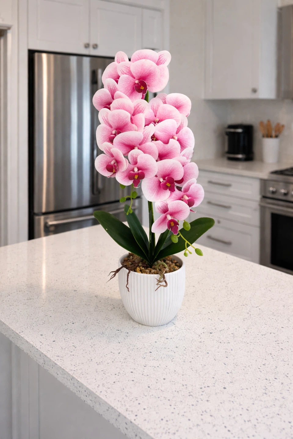 Pink Faux Orchid Plant in White Ribbed Pot