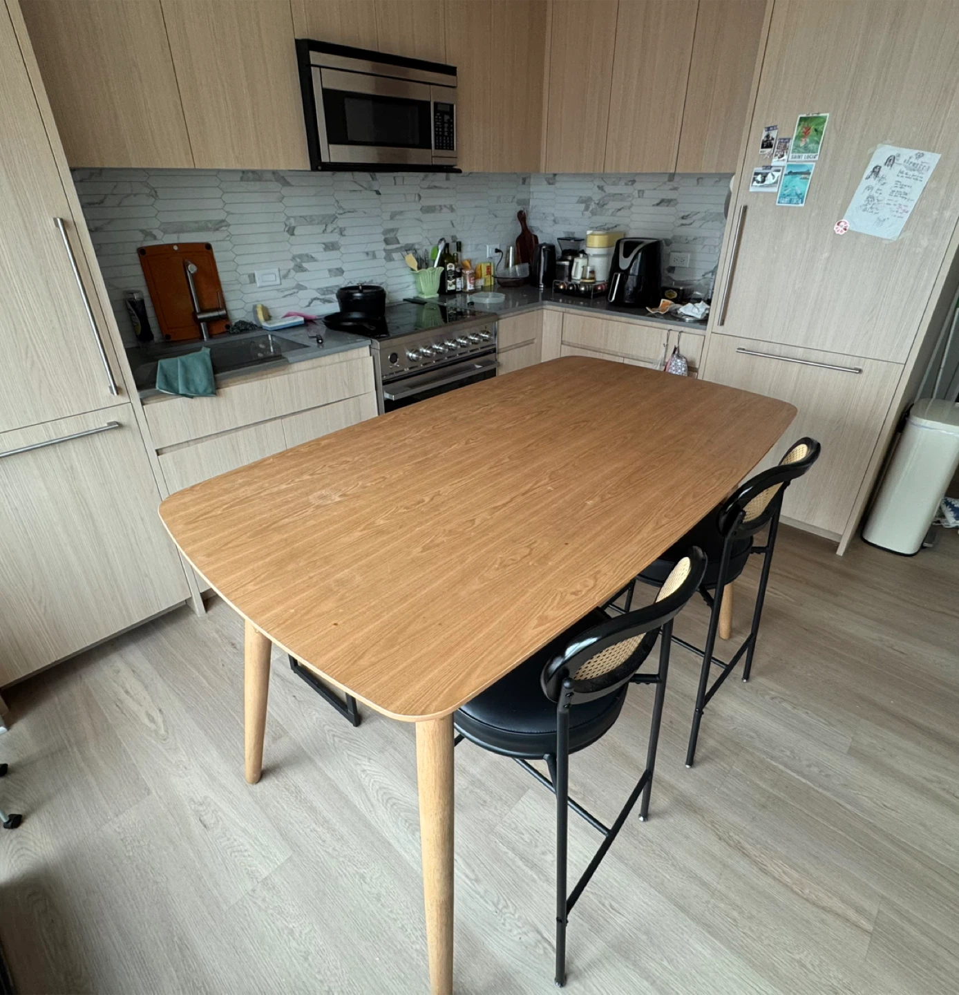 A Counter-height Dining Table with 4 Stools