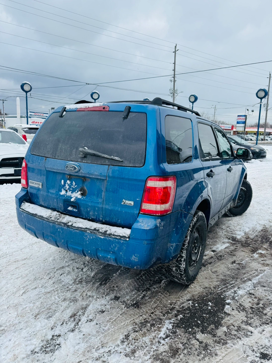 Blue Ford Escape SUV - photo 4