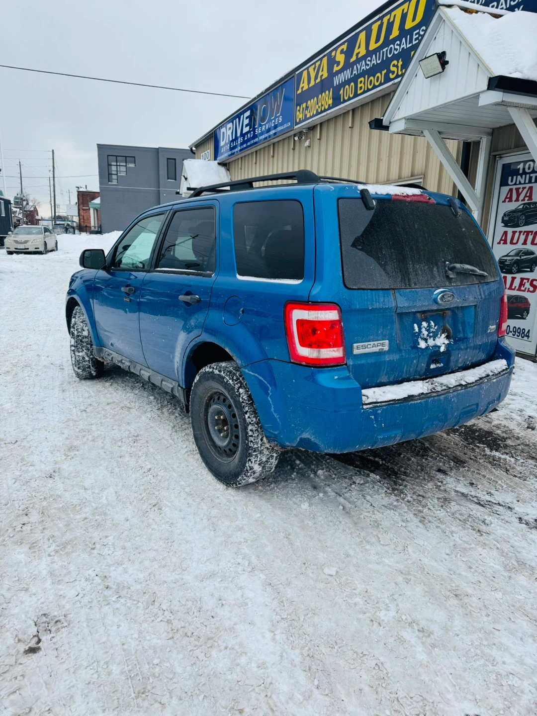 Blue Ford Escape SUV - photo 3