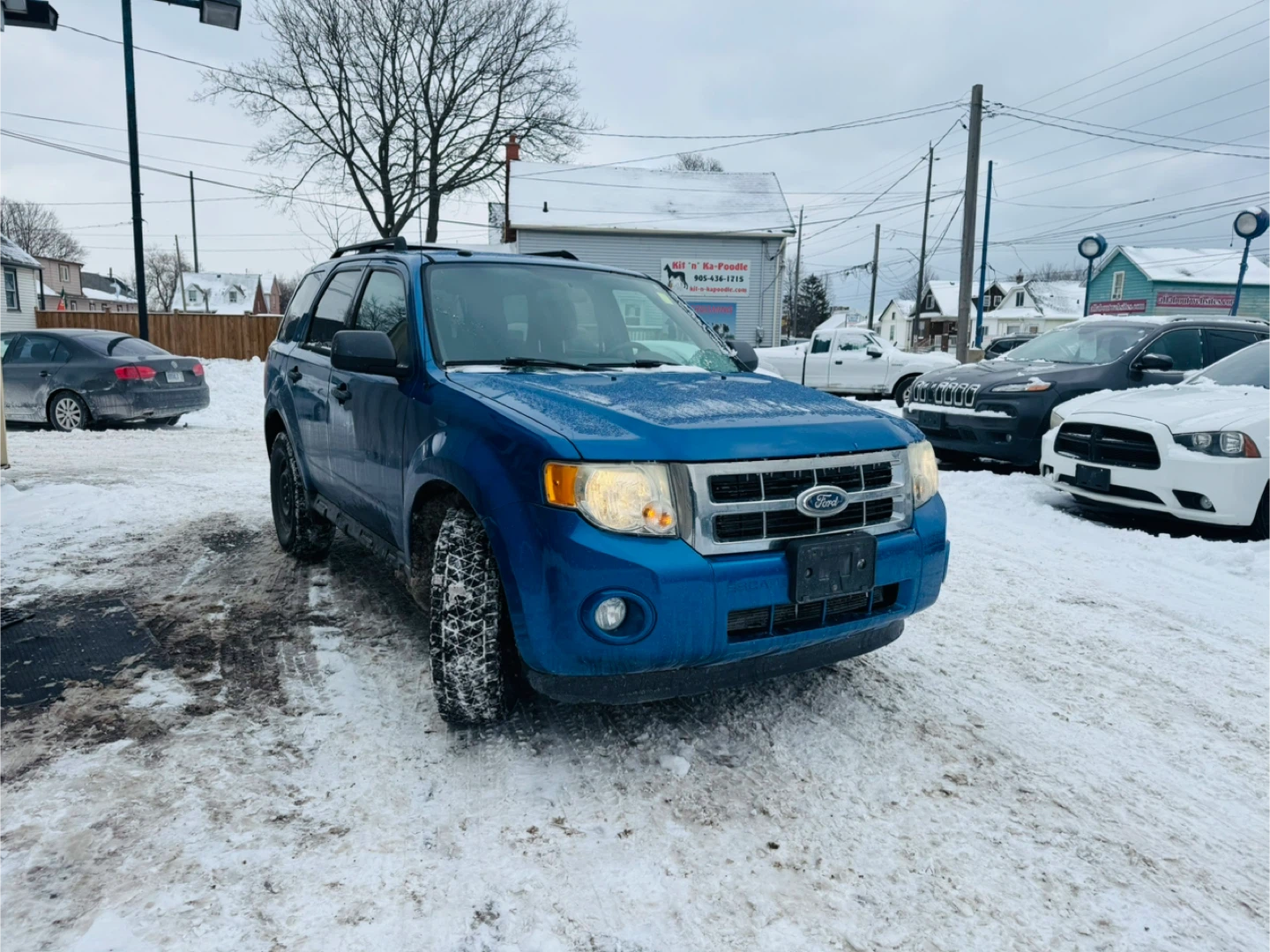 Blue Ford Escape SUV - photo 2