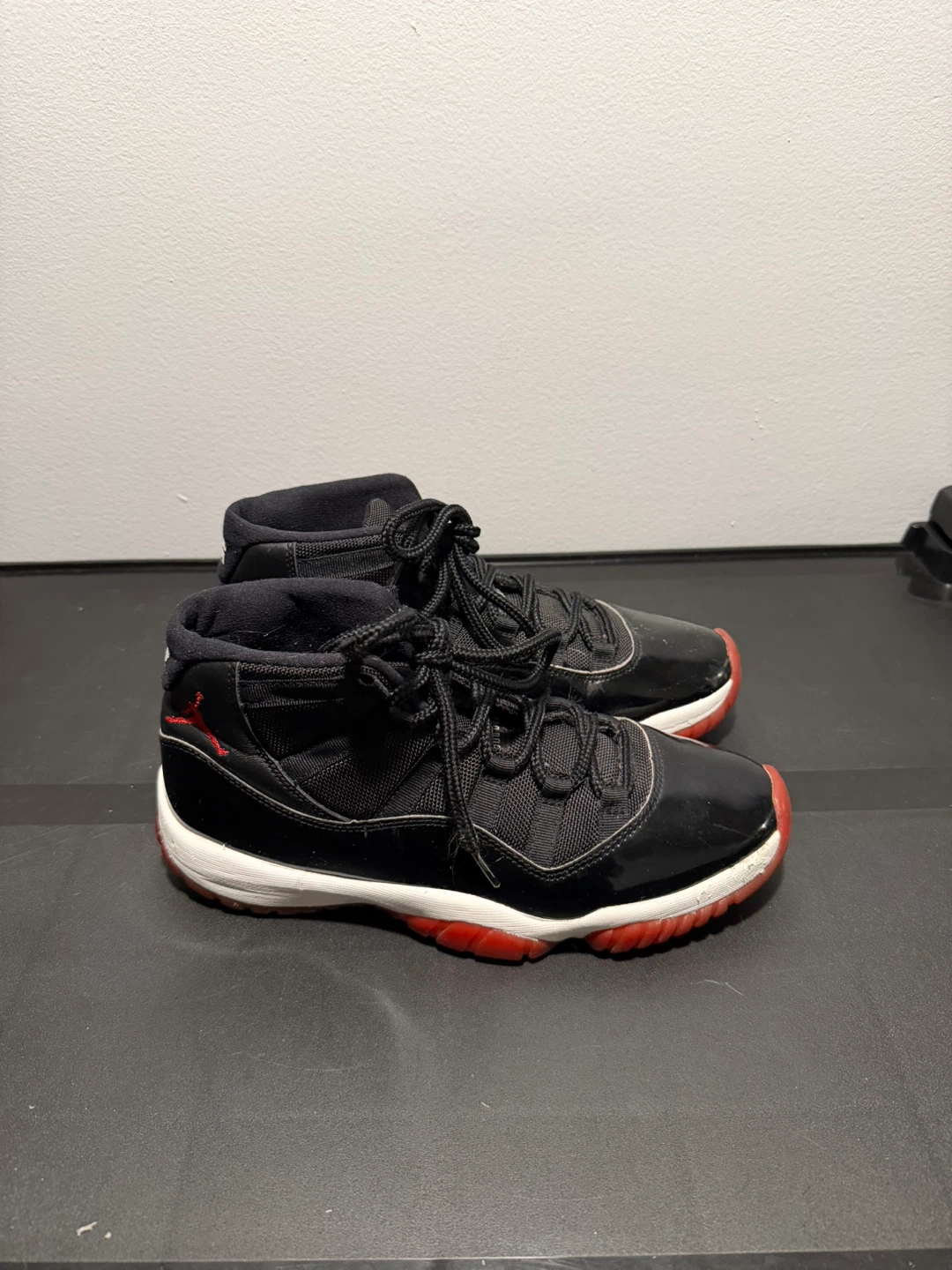 Air Jordan 11 "Bred" Retro High-Top Sneakers
