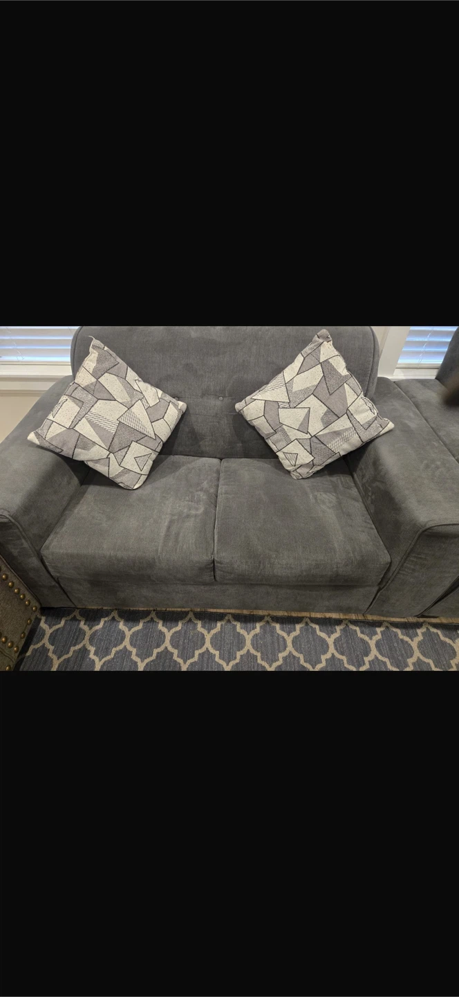 Grey Sofa with Geometric Throw Pillows