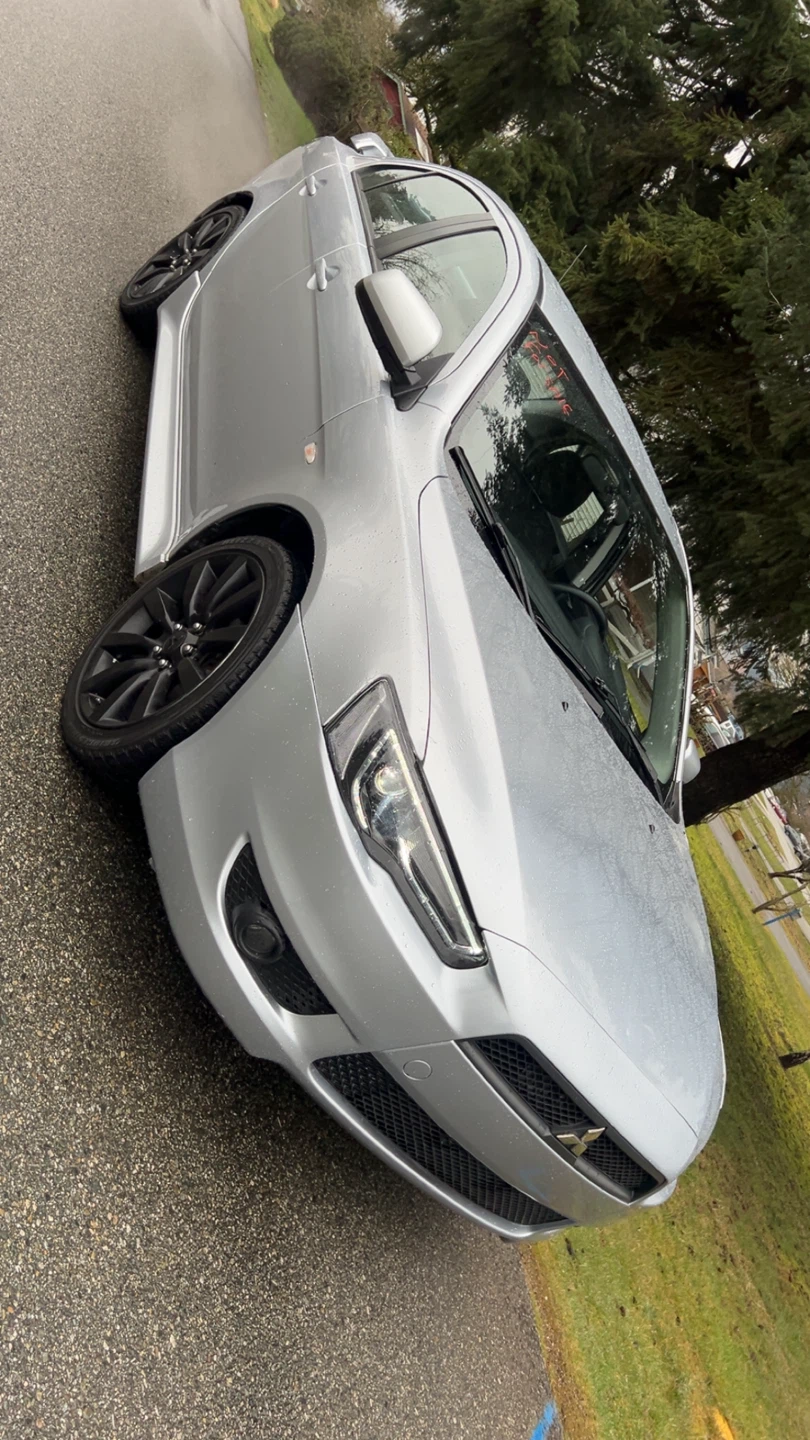 Silver Mitsubishi Lancer with Black Rims - photo 2