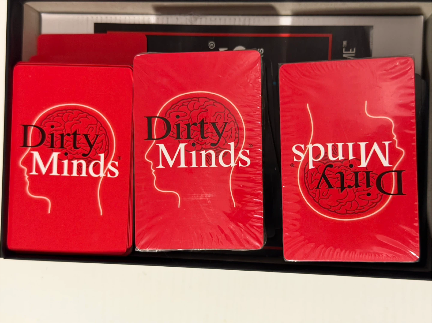 Dirty Minds: The Game of Naughty Clues Card Game - photo 2