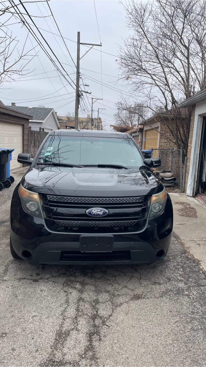 Black Ford Explorer SUV - photo 2