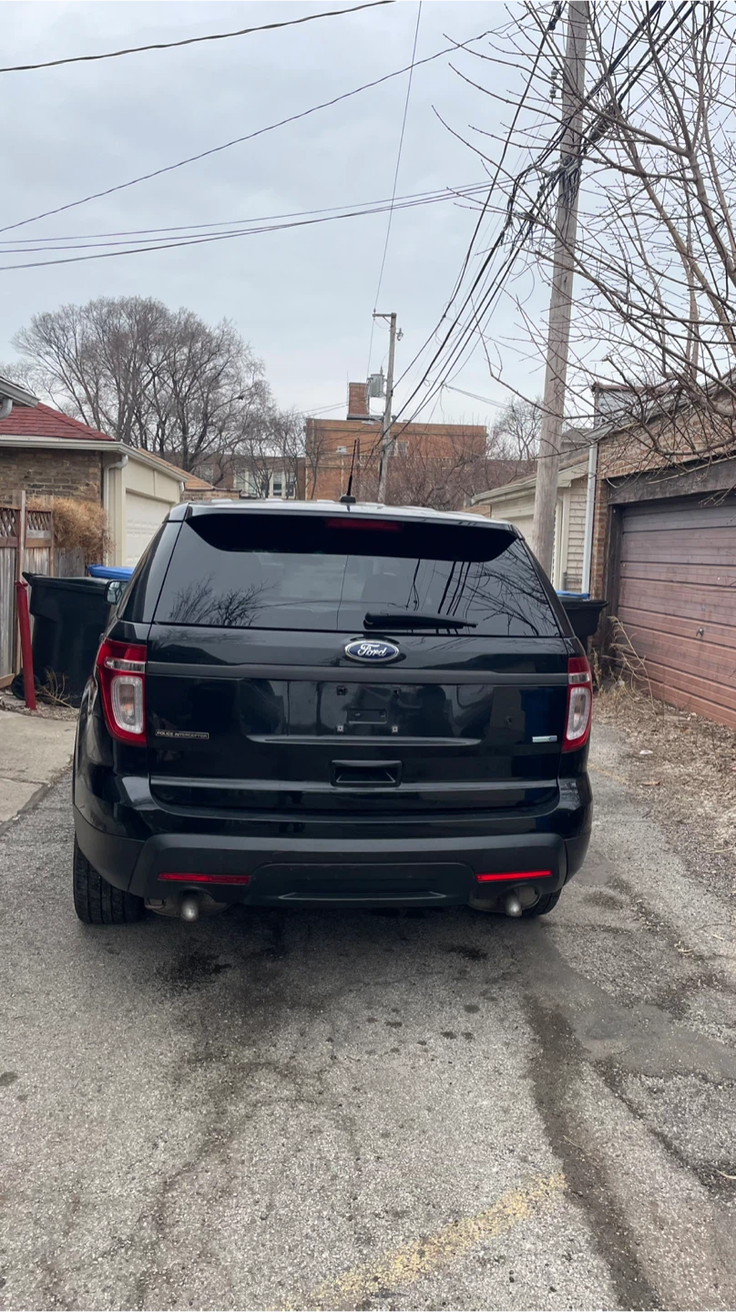 Black Ford Explorer SUV - photo 3