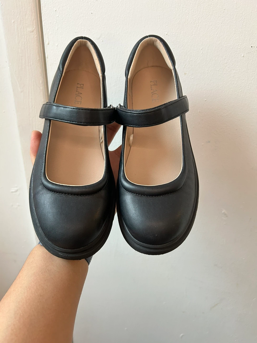 Children place Mary Jane shoes size 4