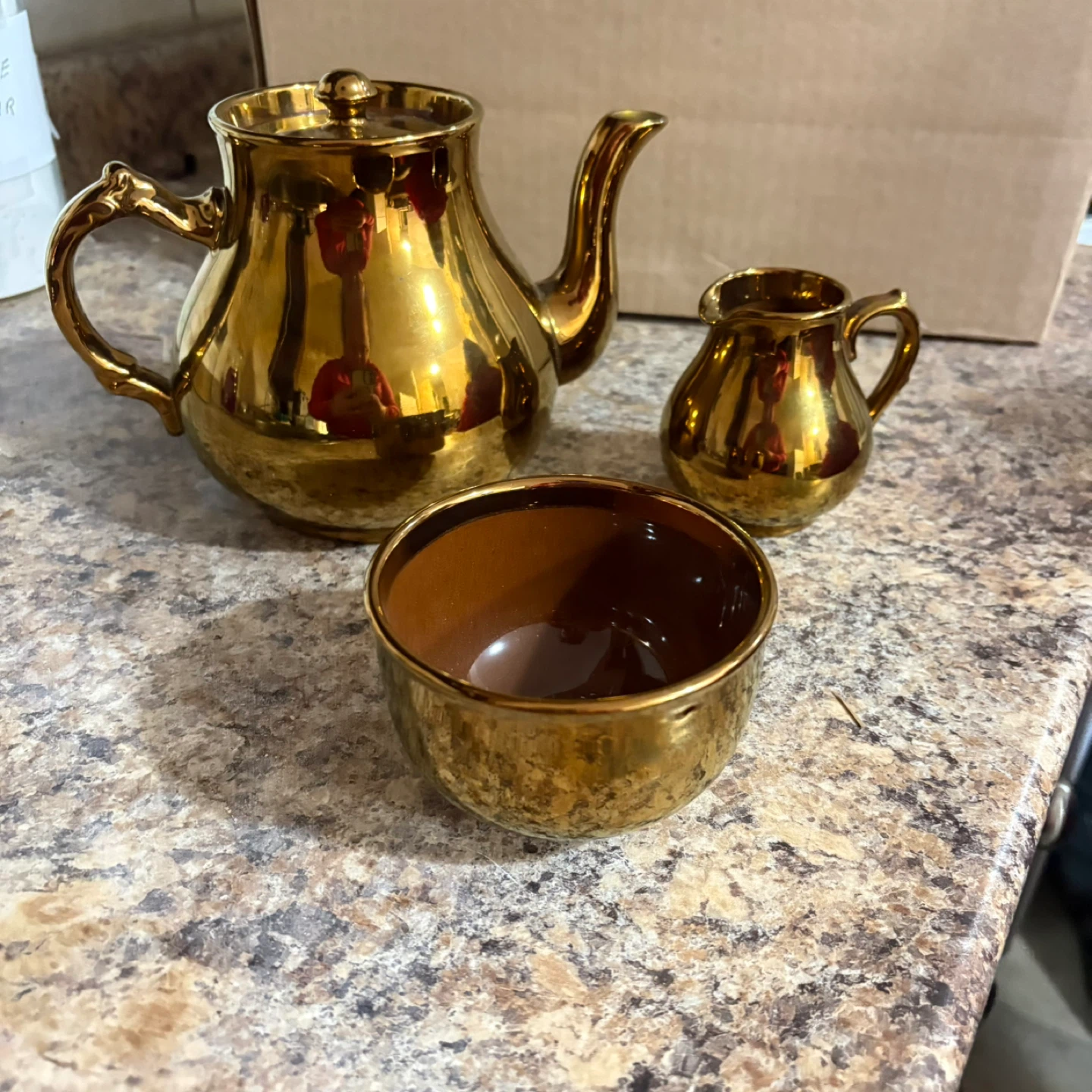 Gold Tone Teapot, Creamer, and Sugar Bowl Set
