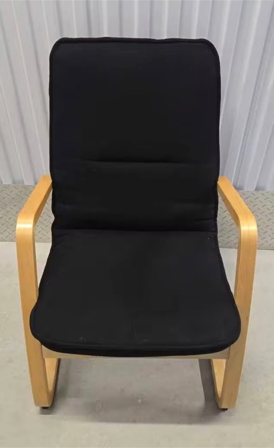 Black Padded Armchair with Wooden Frame