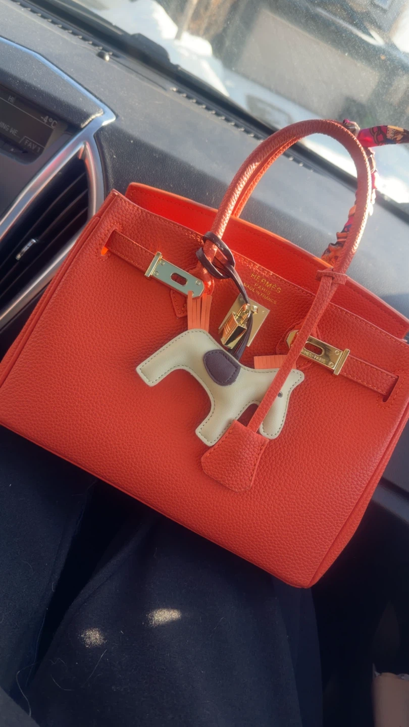 Orange handbag.
