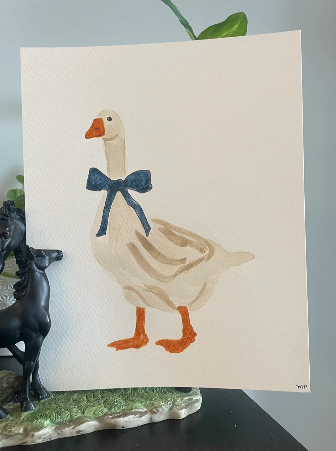 Watercolor Painting of a Goose with a Blue Bow