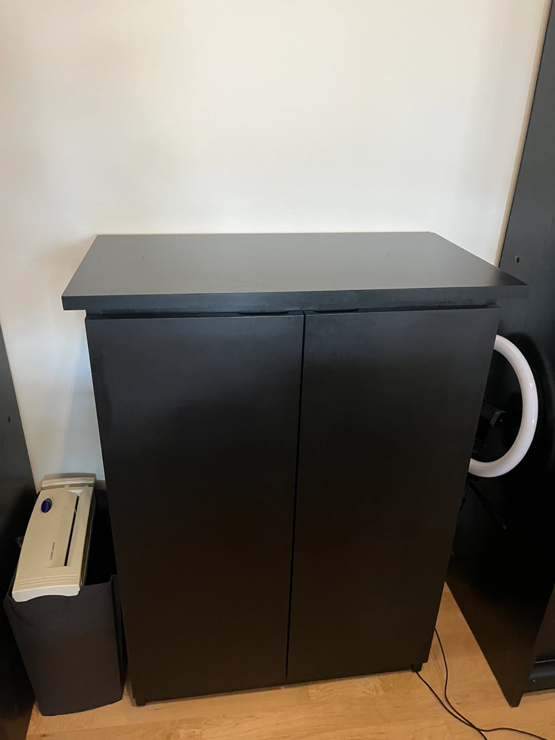 Black two-door storage cabinet