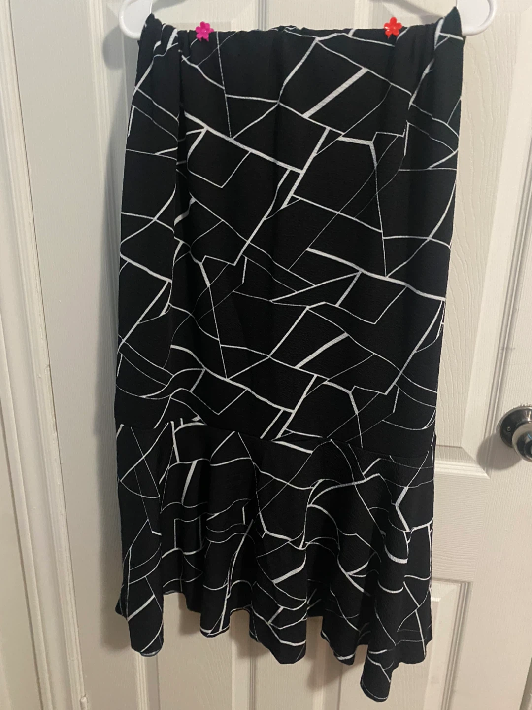 Black and white patterned skirt with ruffle hem