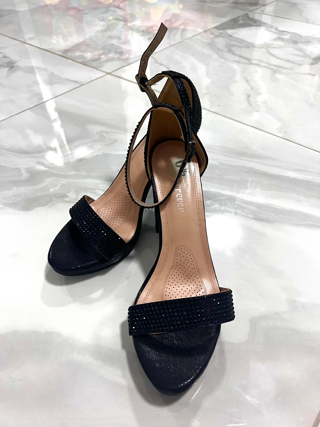 Black jeweled platform heels