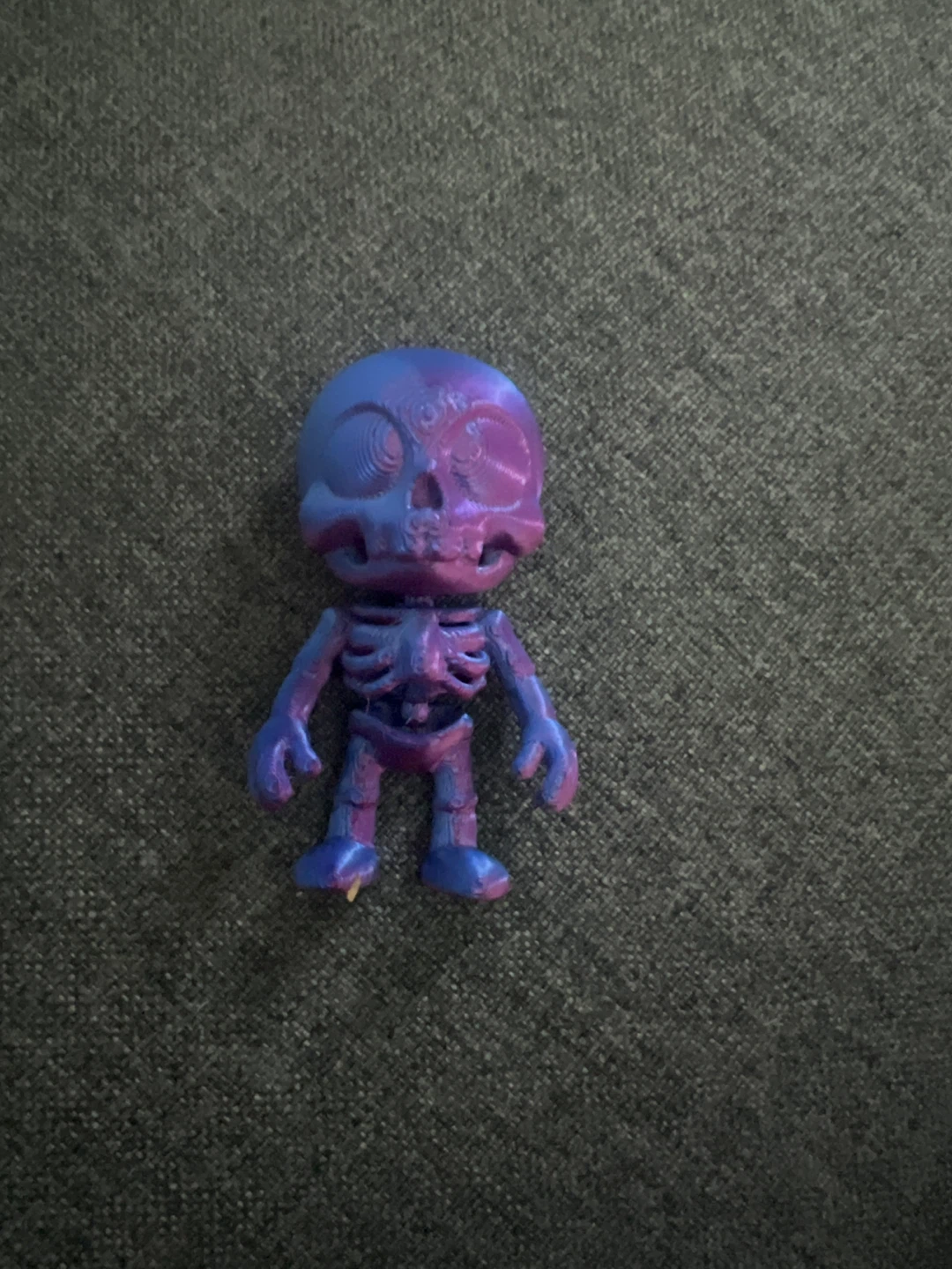 Purple and Blue Skeleton Figurine