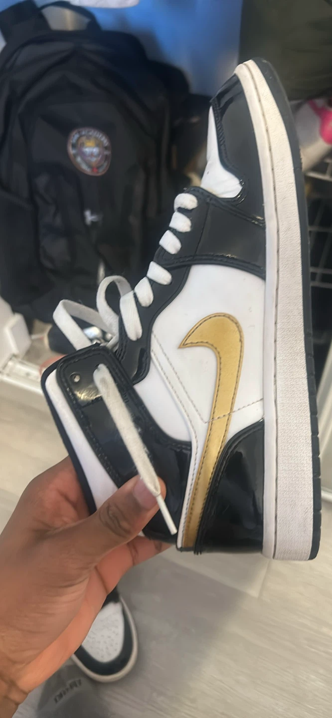 Air Jordan 1 Mid Black White Gold Sneakers