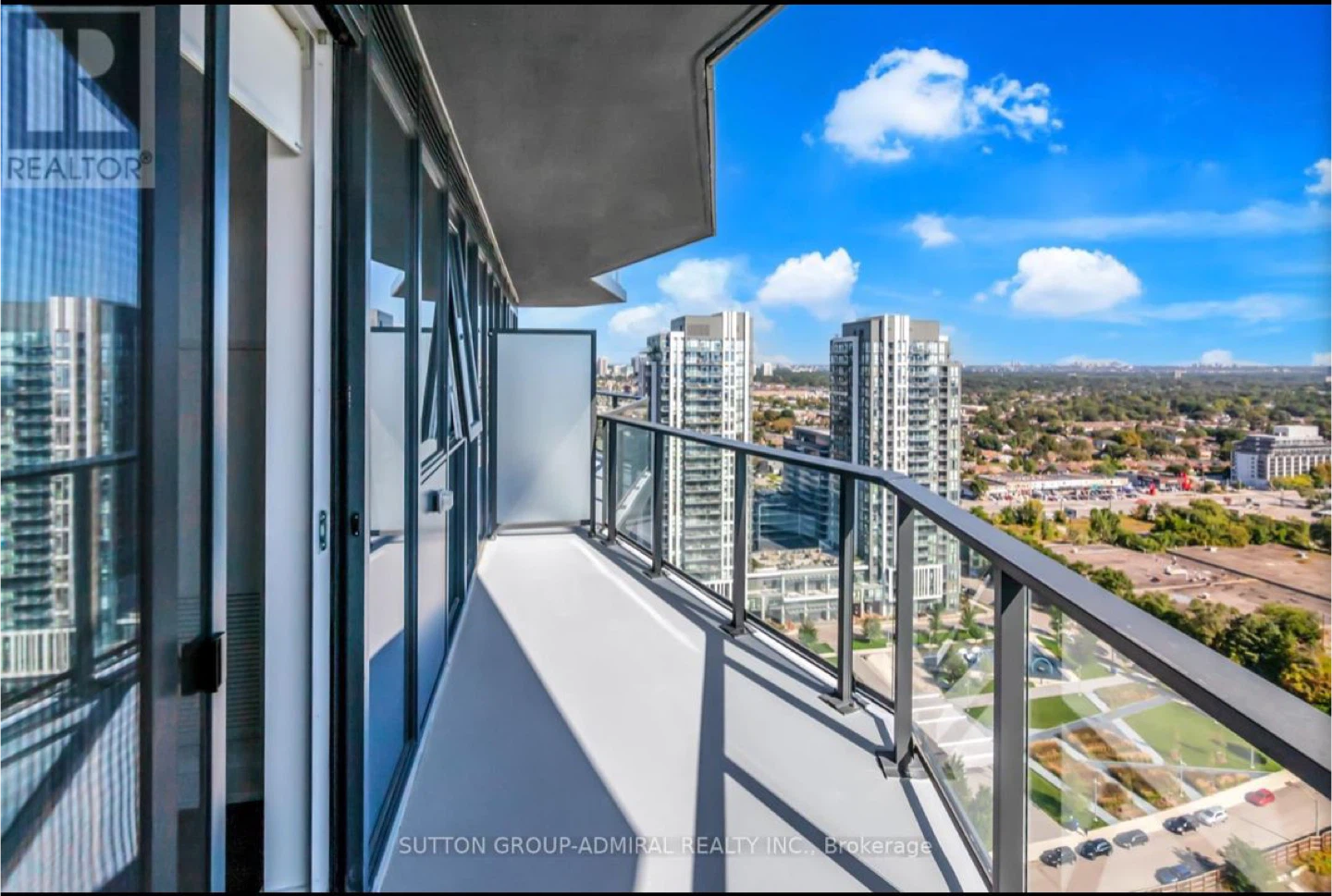 Modern Condo Unit with Balcony 2 Bed 1 Bath + Den - photo 2