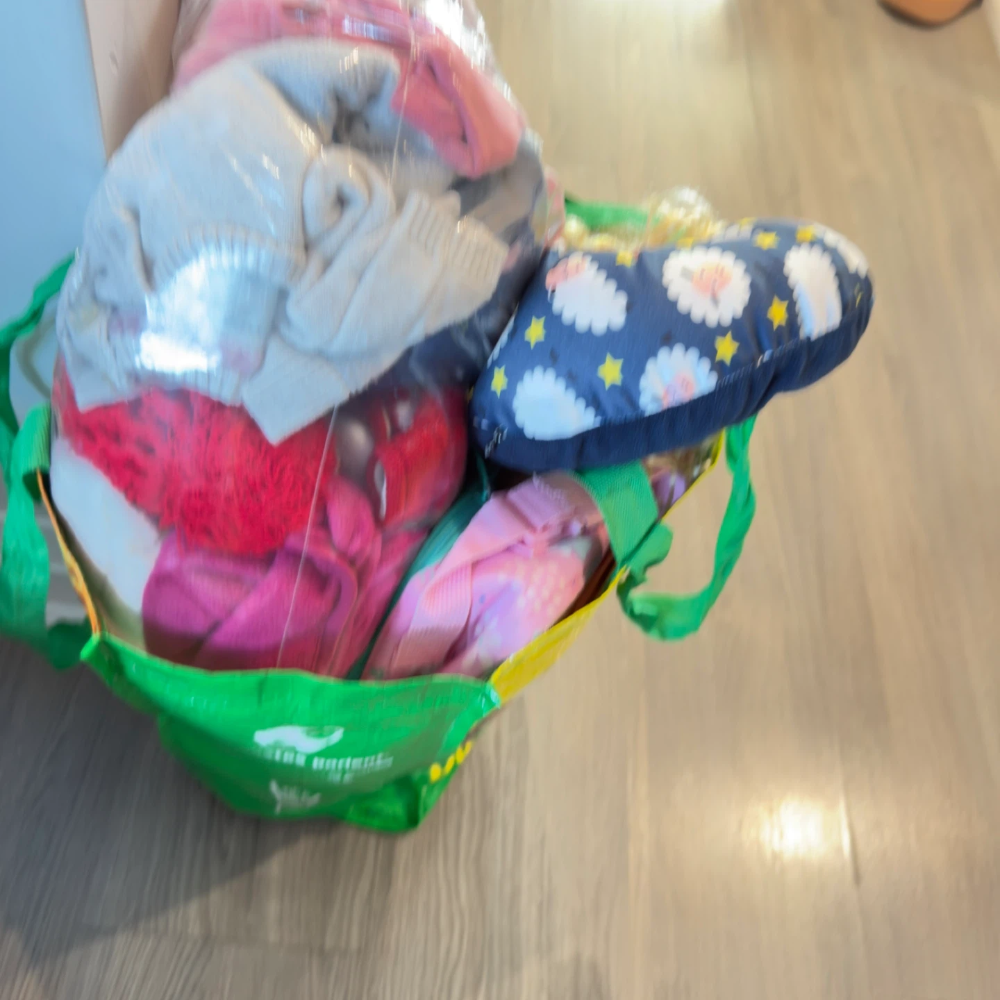 Bundle of Baby Clothes and Cloud Pillow