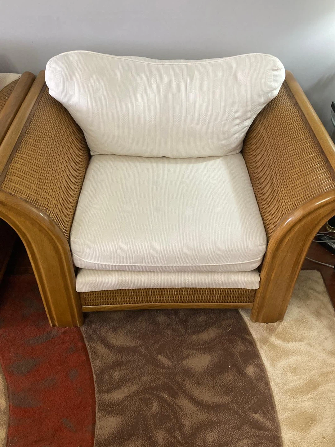 Set of classic wicker chairs and 2 matching ottomans