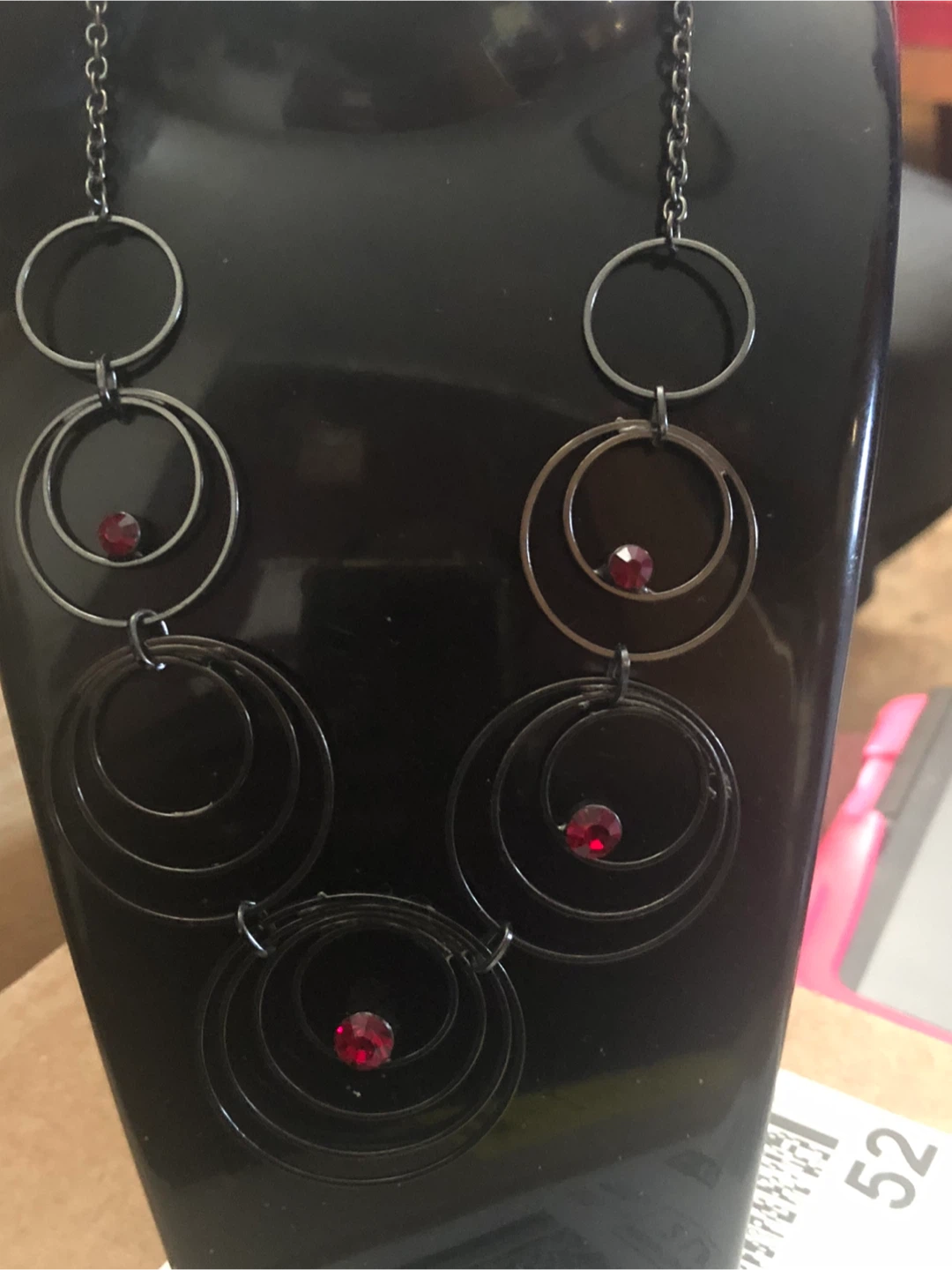 Dark Metal Circle Necklace with Red Gems