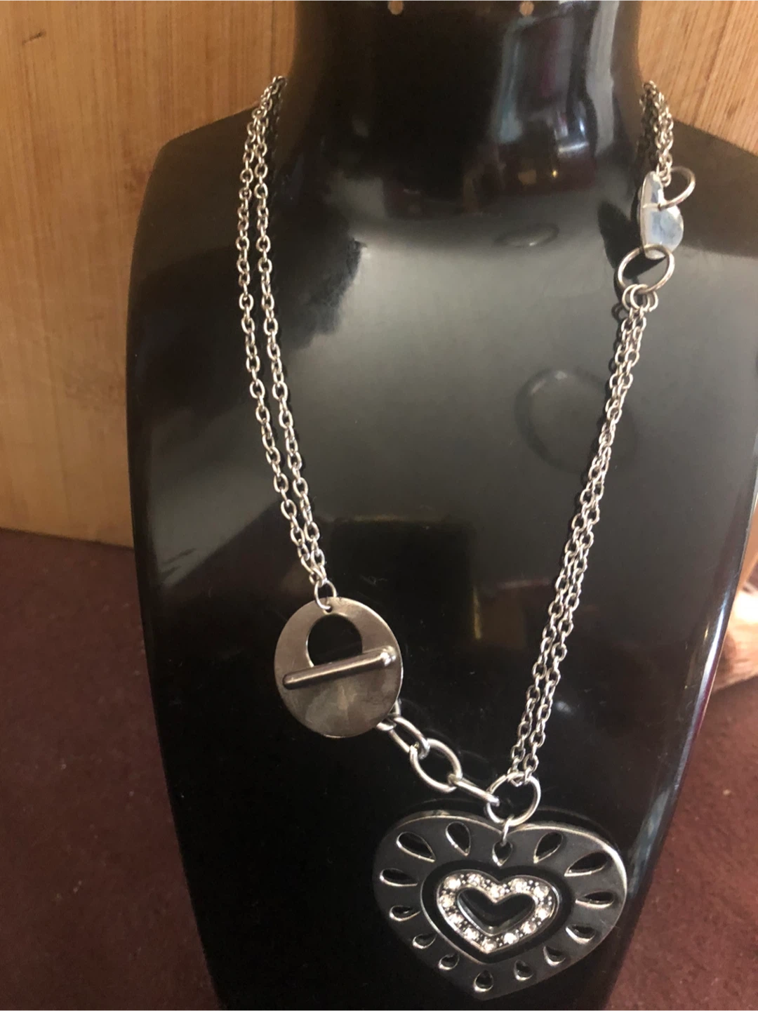 Silver tone heart pendant necklace