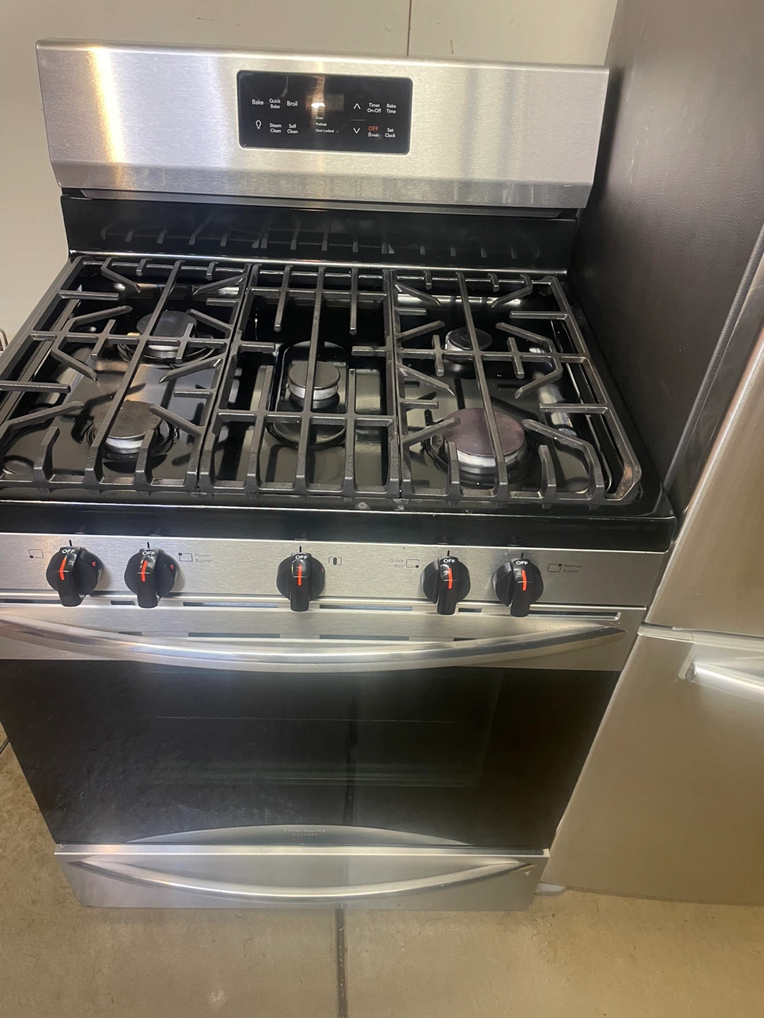 Stainless Steel Refrigerator and Gas Range - photo 5
