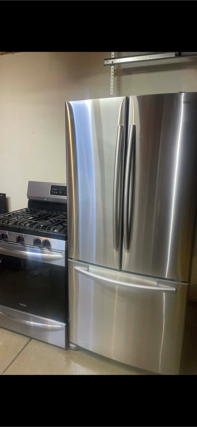Stainless Steel Refrigerator and Gas Range