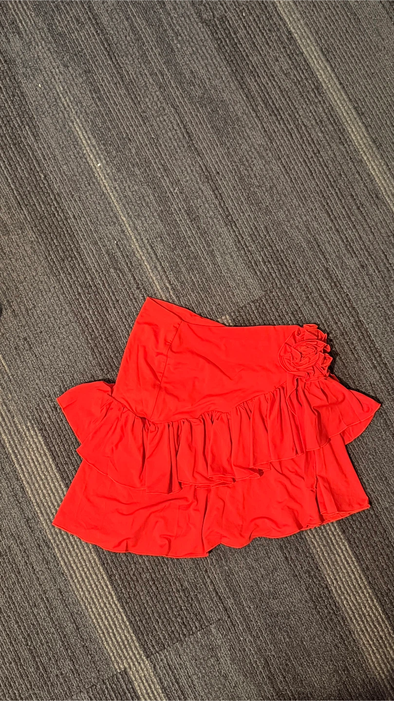 Red Ruffled Skirt with Flower Accent