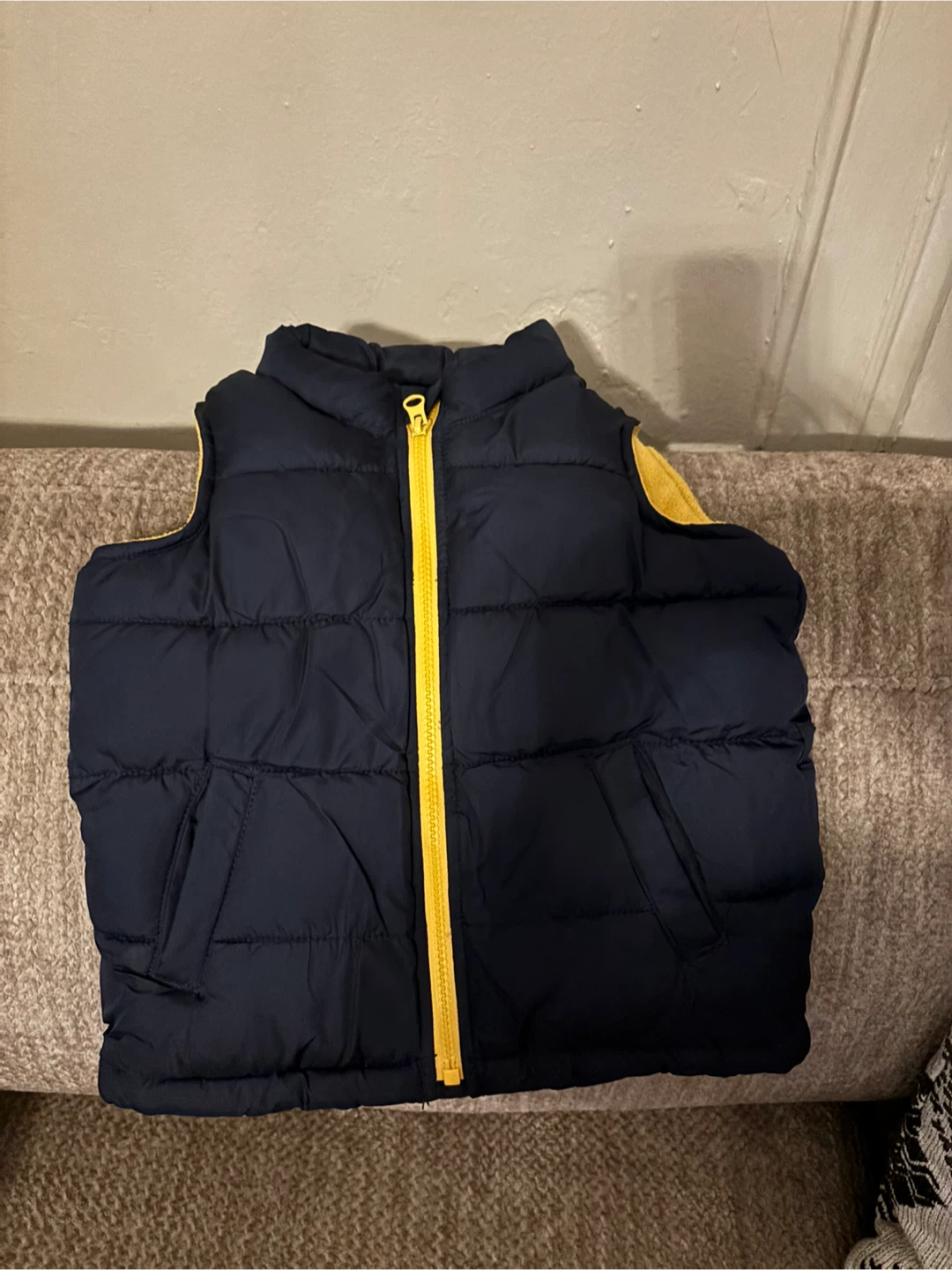 Old Navy Blue Puffer Vest with Yellow Zipper